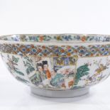 A Chinese famille vert porcelain bowl, hand painted figures in gardens, diameter 18cm