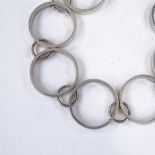 A Hans Hansen Danish sterling silver circular panel bracelet, length 21cm, 44.7g