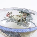 A Chinese fine porcelain bowl with painted enamel figures in a boat and text, diameter 14cm