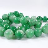 *Description Change* A long string of polished quartz beads, each bead diameter approx 16mm,