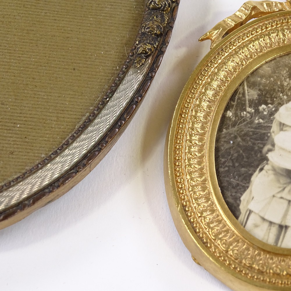 A small Edwardian oval photo frame, height 13cm, and a gilt-metal photo frame with ribbon top, - Image 2 of 3