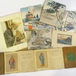 A group of Japanese woodblock prints, postcards, and book