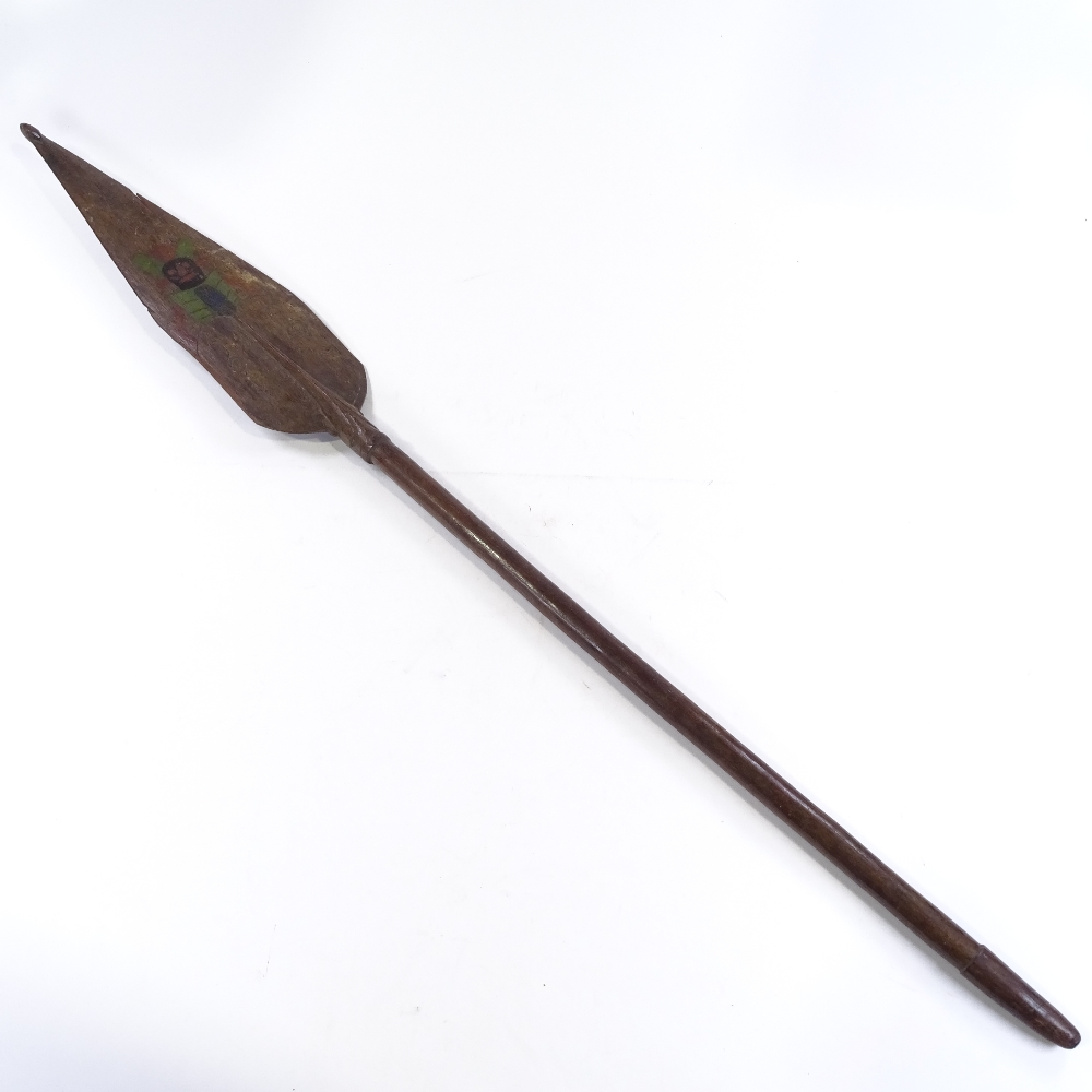 A Papua New Guinea Tribal carved and painted wood ceremonial spear paddle, length 1.3m - Image 2 of 3