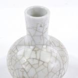 A Chinese white crackle glaze porcelain narrow-neck vase, height 9cm