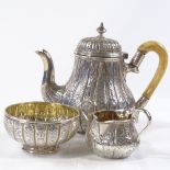 A Victorian silver 3-piece batchelor's tea set, of baluster form, with all over engraved decoration,