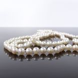 A single strand long opera cultured pearl necklace, with 14ct gold barrel clasp, length 36"