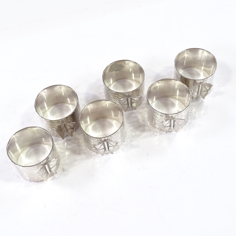 A set of 6 silver napkin rings, with applied butterfly motif, height 3cm, 7.1oz - Image 2 of 3