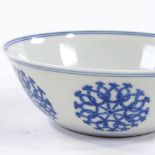 A Chinese blue and white porcelain bowl, with painted geometric designs, 6 character mark,