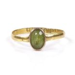 A 22ct gold solitaire peridot ring, setting height 7.1mm, size N, 1.3g