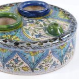 A Turkish pottery cylindrical desk stand with inkwells, diameter 13cm