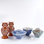 A group of Oriental porcelain bowls and vases, largest blue and white bowl diameter 11cm