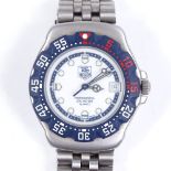 TAG HEUER - a stainless steel Professional 200M mid-size quartz wristwatch, blue bezel with luminous