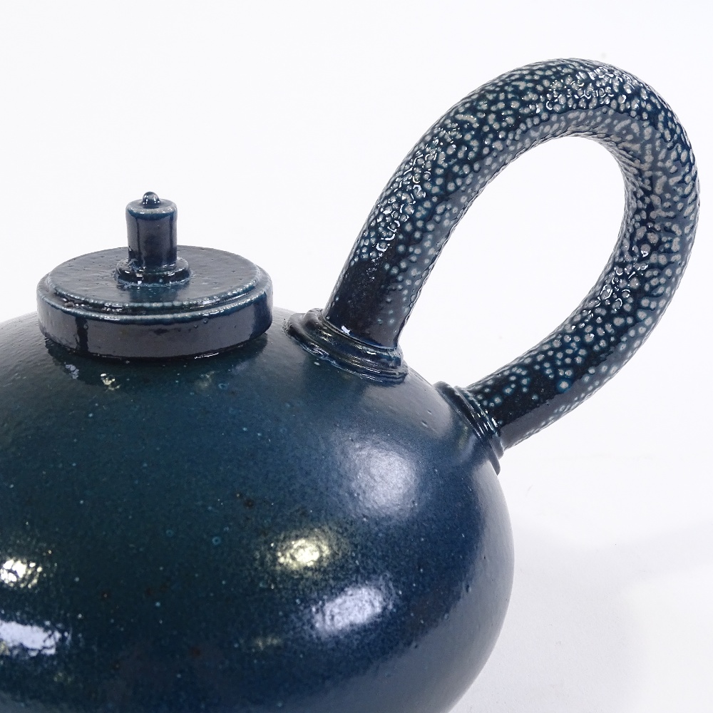 Walter Keeler (British born 1942), blue salt glaze pebble form teapot, impressed maker's mark,