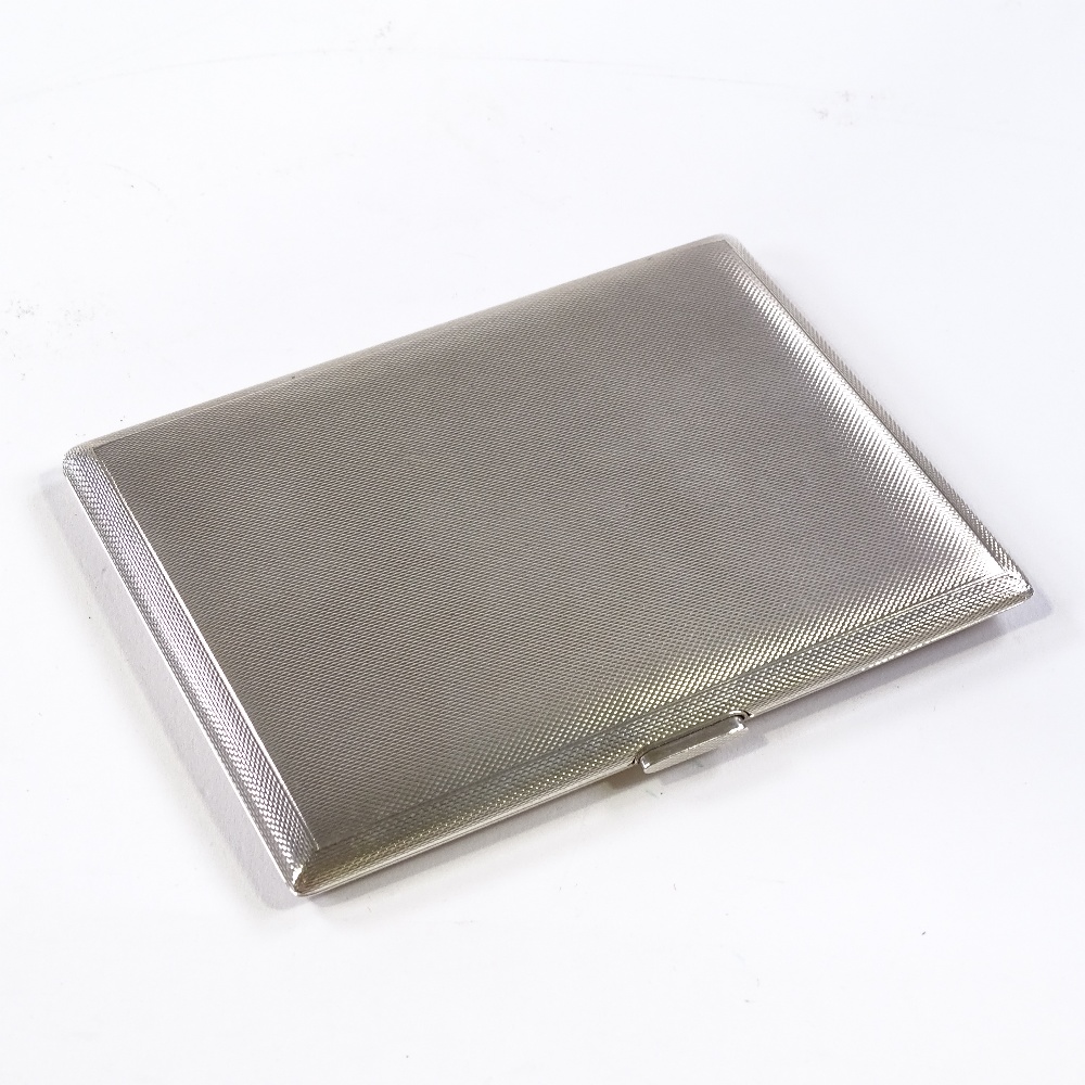 A rectangular silver cigarette case, with gilded interior, by Garrard & Co Ltd, hallmarks Birmingham - Image 2 of 3