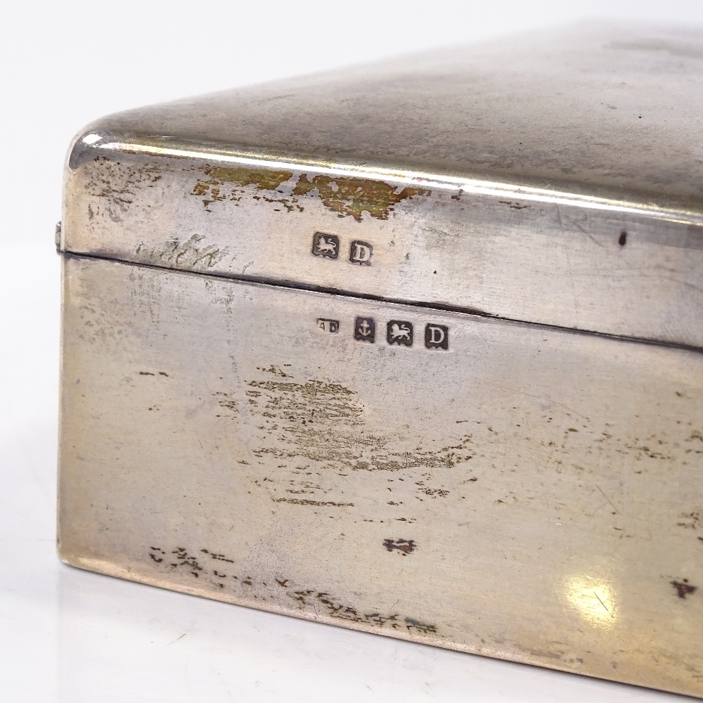 A rectangular silver cigarette box, by Alfred Deeley, hallmarks Birmingham 1928, length 16cm - Image 2 of 3