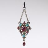 An Austro-Hungarian silver ruby turquoise and enamel lavaliere pendant, with stylised openwork