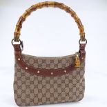 A Gucci handbag with bamboo handle, length 27cm