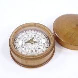 A treen-cased compass/sundial, diameter 5cm