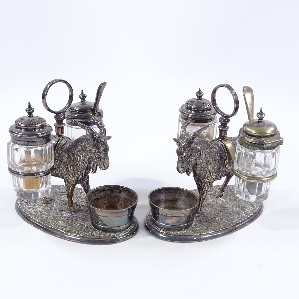 A pair of Victorian electroplate table cruets, supported by goats, original cut-glass mounts, height - Image 2 of 3