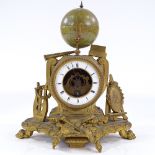 A 19th century gilt-metal cased mantel clock, surmounted by a 3" (7.5cm) revolving globe, height