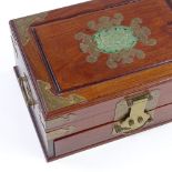 A Chinese brass-bound mahogany jewel box, with inset green stone plaque to the lid, width 30cm