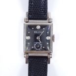 BULOVA - a 14ct white gold mechanical wristwatch, square black dial with diamond set quarterly