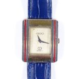 A lady's Gucci quartz wristwatch, silver-gilt case with enamel band bezel, case width 24mm