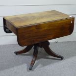 A George IV mahogany drop leaf breakfast table, on quadruple base