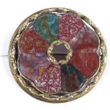 A Scottish hardstone circular brooch, set with bloodstones and agates, in unmarked yellow metal