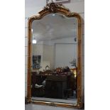 A large 19th century French 2-tone gilt-gesso framed wall mirror, with acanthus pediment, and relief
