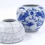 A Chinese blue and white porcelain vase, with dragon design, height 8cm, and a crackle glaze