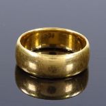A 22ct gold wedding band ring, maker's marks WM, hallmarks Birmingham 1900, band width 5.3mm, size