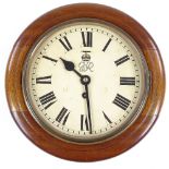 A George VI mahogany-cased dial wall clock of small size, 20cm dial, 27cm diameter overall