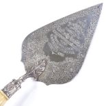 A late Victorian silver and ivory-handled presentation trowel, with engraved acanthus decoration,