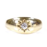 An 18ct gold solitaire diamond gypsy ring, maker's marks T Bros, setting height 7.9mm, size L, 3.7g