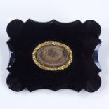A Victorian jet panel mourning brooch, with central crystal covered hair panel, brooch length 44.