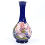 A Moorcroft Magnolia pattern narrow-necked vase, height 21cm