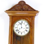 A 19th century Lenzkirch walnut-cased Vienna regulator wall clock, with carved case and 8-day