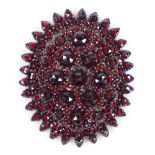 A large Victorian faceted garnet pendant, unmarked garnet gold settings, pendant length 54.4mm, 17g