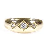An 18ct gold 3-stone diamond gypsy ring, hallmarks Birmingham 1906, setting height 7mm, size L, 5.1g