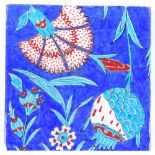 A Turkish hand painted pottery tile, 20.5cm across