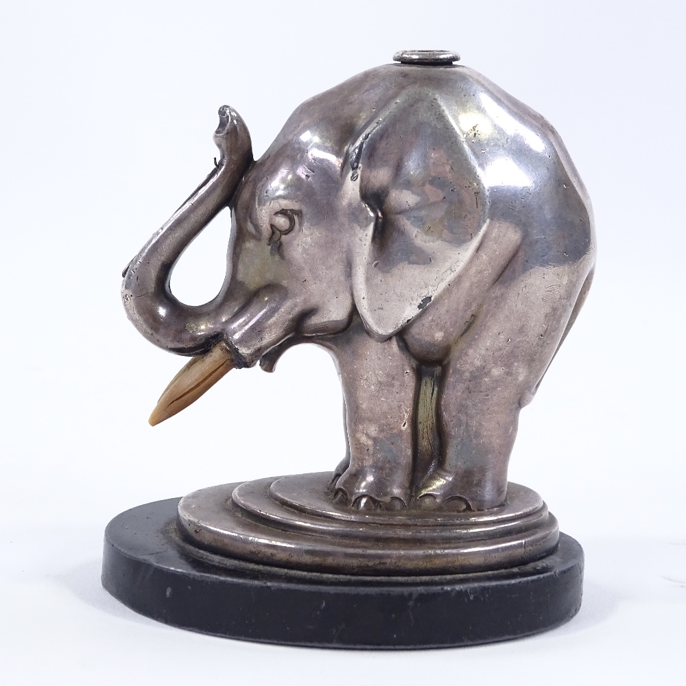 An Art Deco electroplate elephant design table lighter, no visible factory marks, height 10.5cm