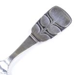 A mid-century Swedish silver caddy spoon, with stylised floral handle, maker's marks MG AB, possibly