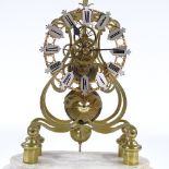 A brass skeleton clock with single fusee chain-driven movement, white marble base, and silvered