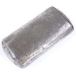 An Antique unmarked silver oval cigar case, with engine turned floral and Oriental designs, length