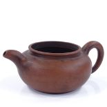 A Chinese Yixing red ware pottery teapot, impressed seal mark, rim diameter 10cm