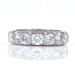 A platinum and diamond full eternity ring, set with 16 round brilliant-cut diamonds, each approx 0.