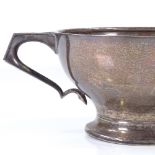 A circular silver 2-handled cup, of plain form, by Josiah Williams & Co, hallmarks London 1930,