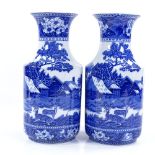 A pair of Wedgwood Pottery Fallow Deer pattern blue and white vases, height 30cm