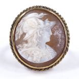 An unmarked gold large relief carved cameo panel ring, depicting Classical man with mask, within a